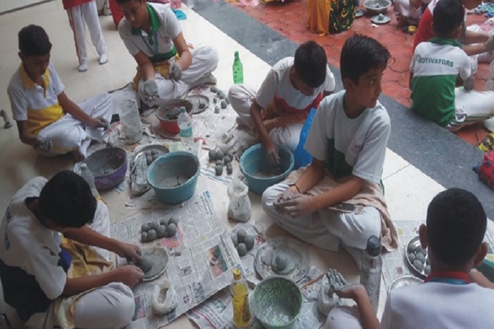 Achievers Heights International School-making ganapathi idols