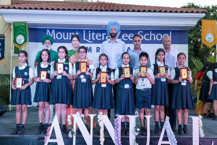 Mount Litera Zee School-Trophies to the Students