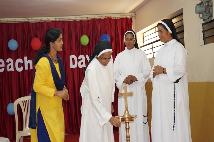 St Dominics School-Lighting the lamp