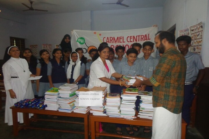 Carmel Central School-Note Books And Pen Donation Activity